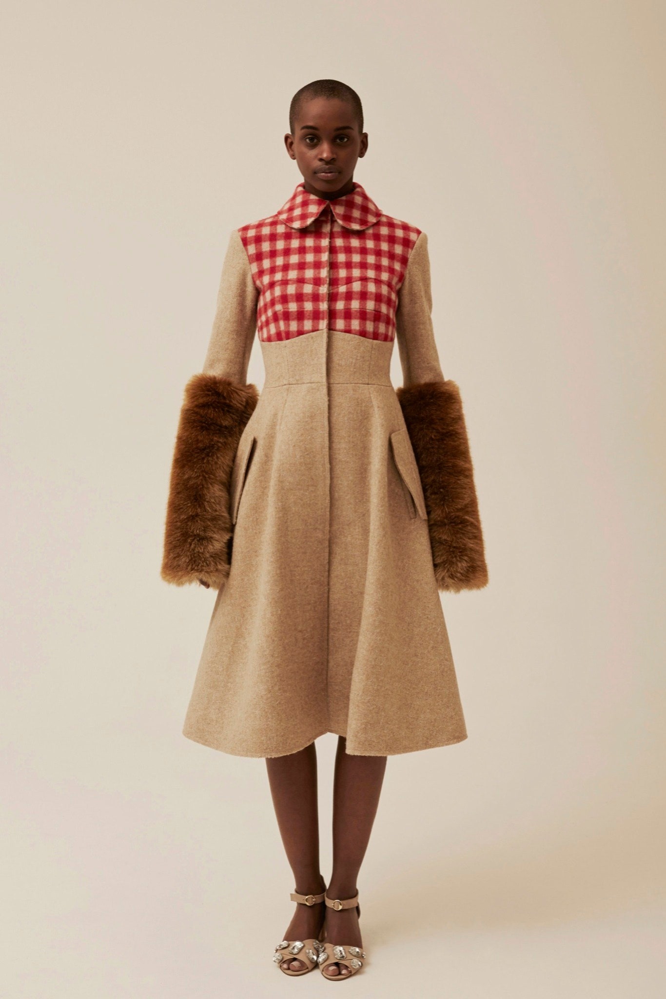 beige and red pleated dress