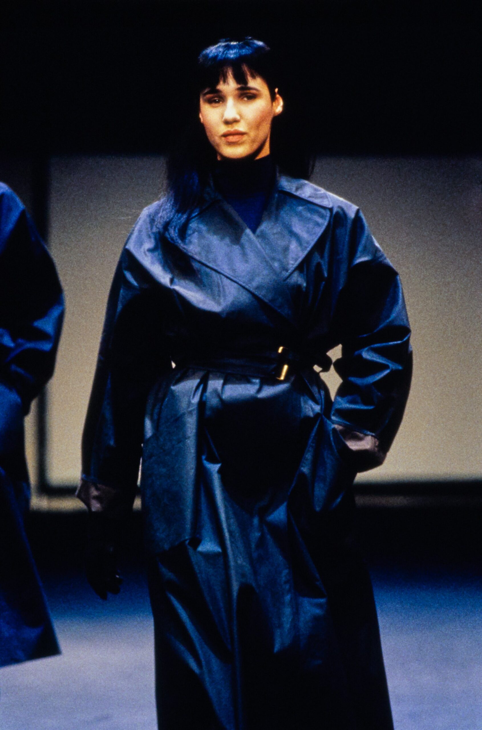 black vinyl belted coat