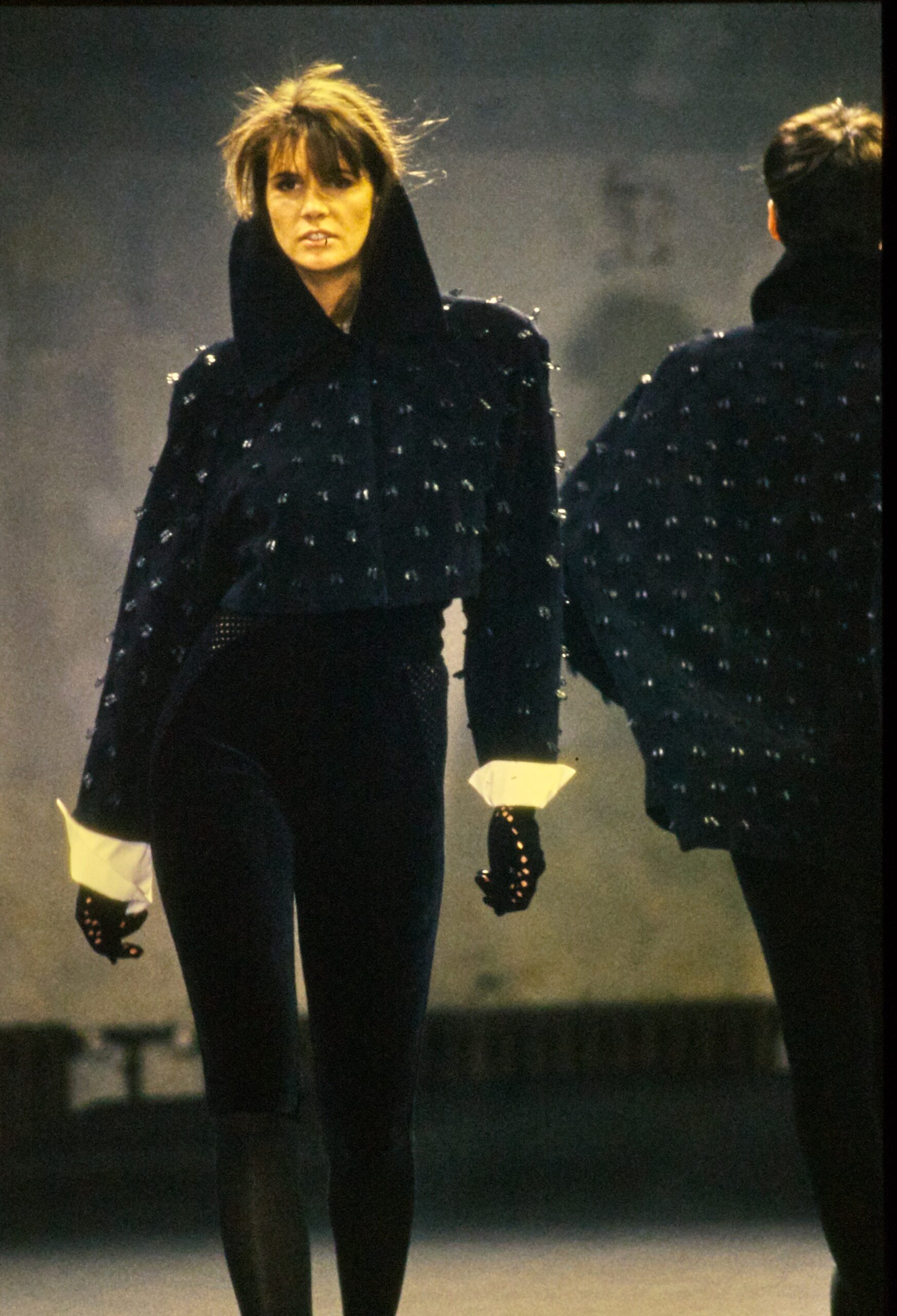 black velvet embellished cape and fitted pants