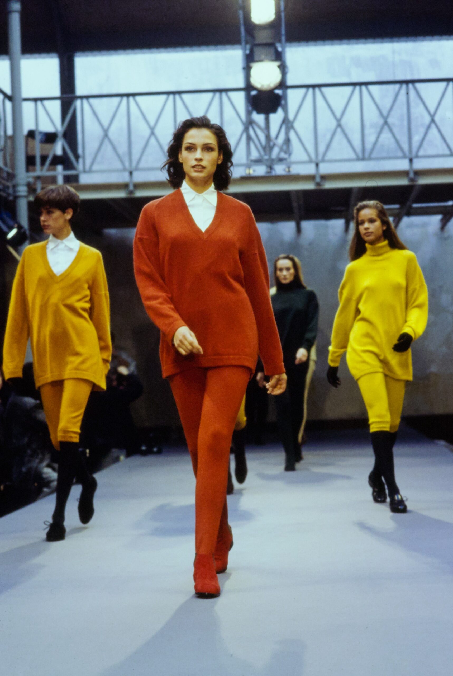 red oversized sweater and fitted pants
