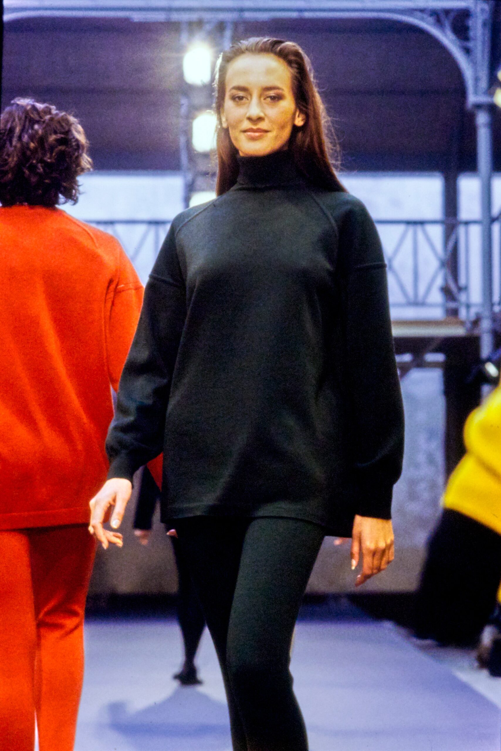 green relaxed turtleneck top with fitted pants