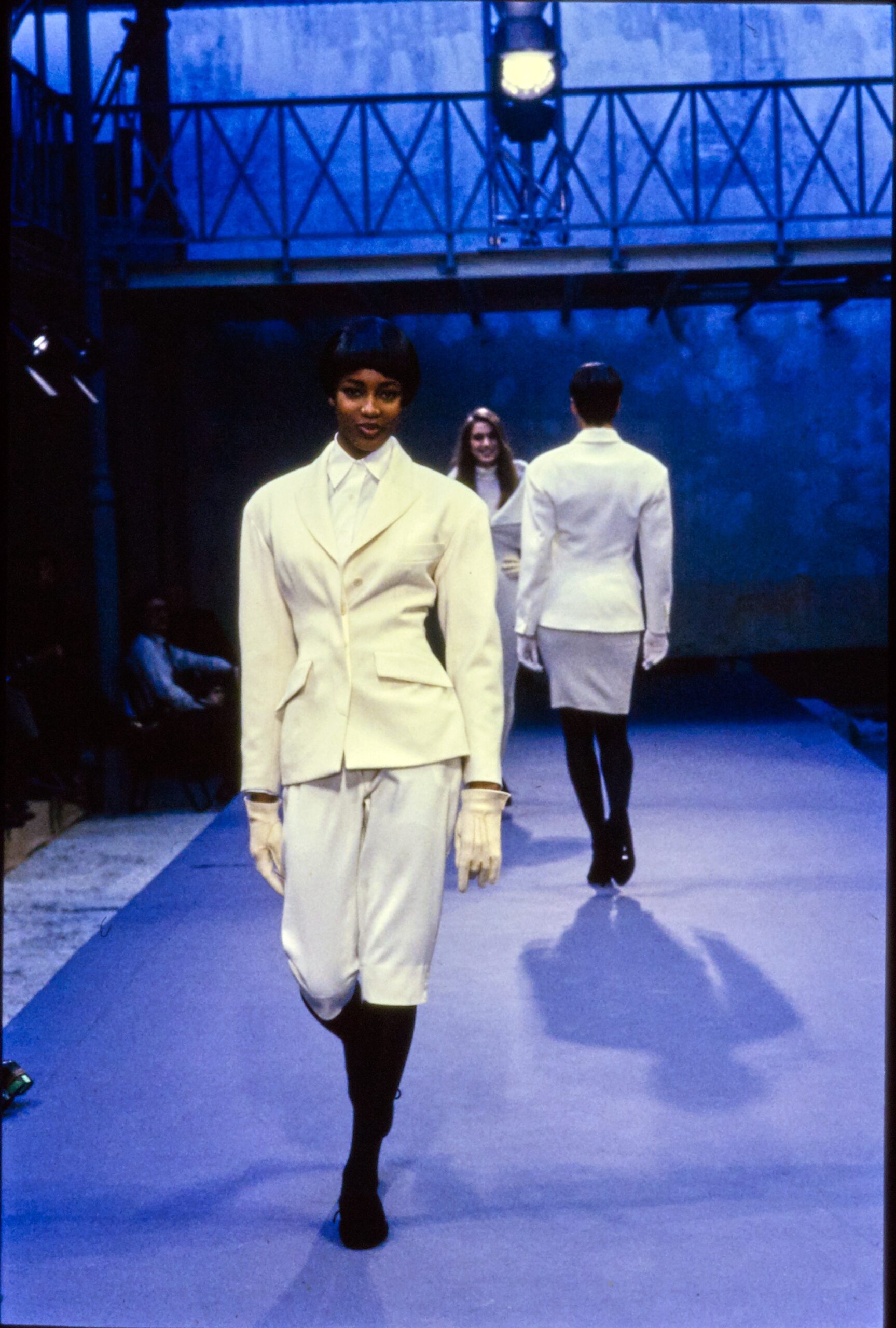 white fitted suit with gloves