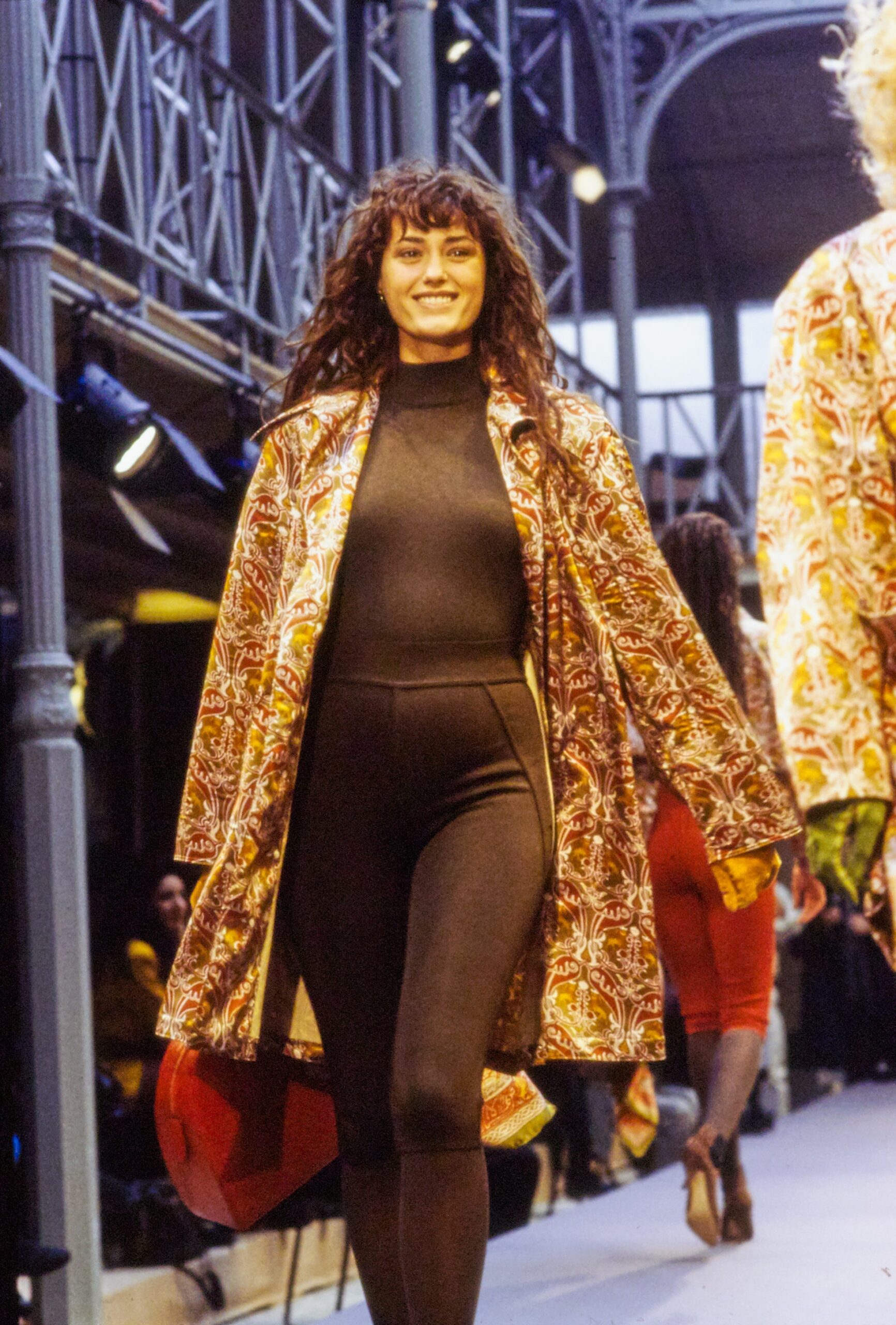 multi-colored silk coat with black top and pants