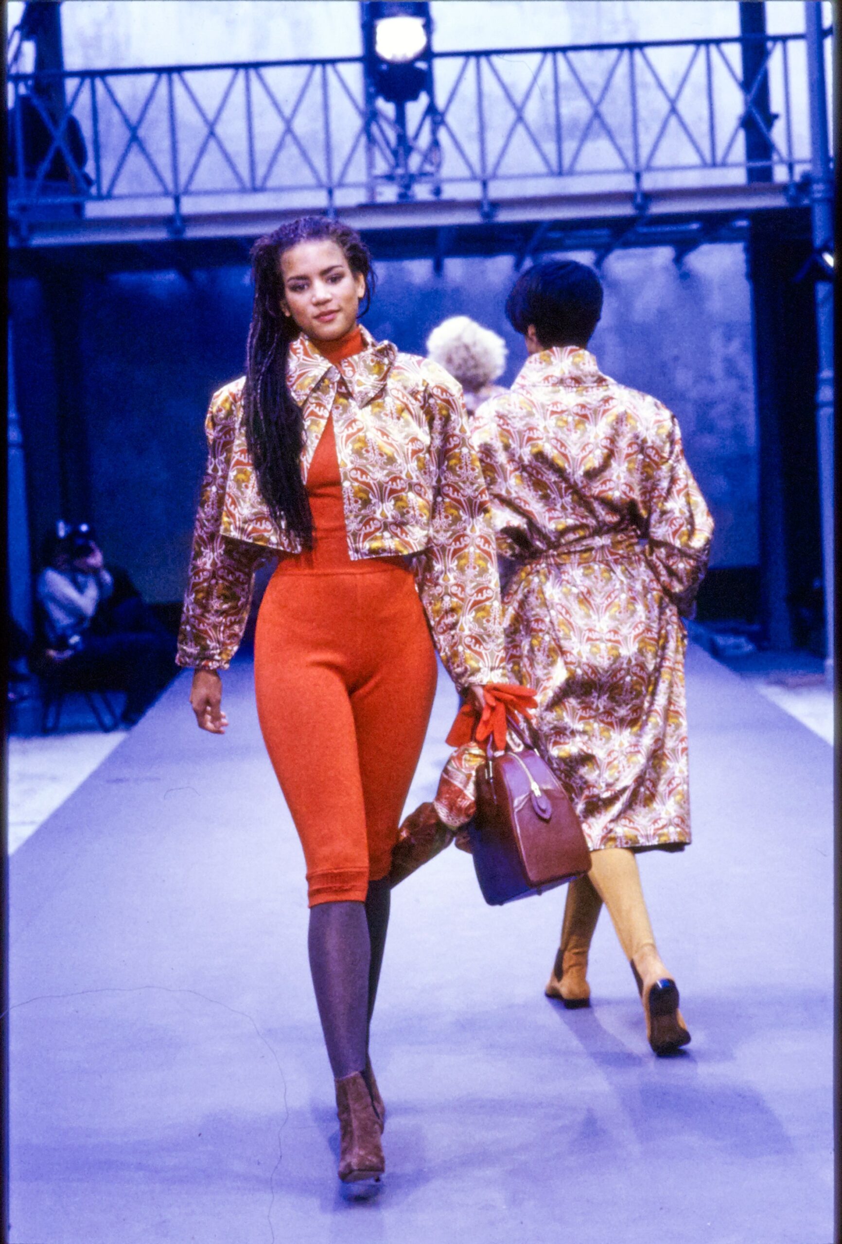 multi-colored fitted jacket with red bodysuit