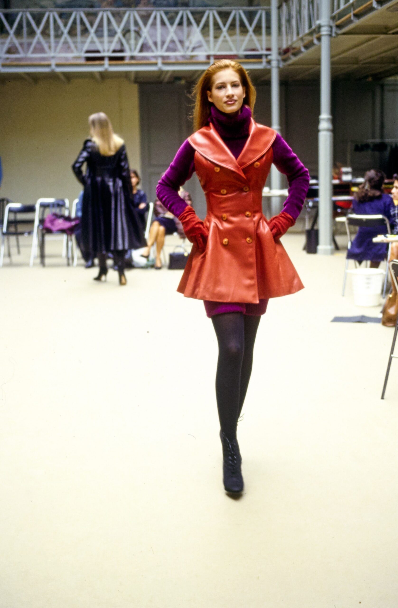 red silk coat and purple dress