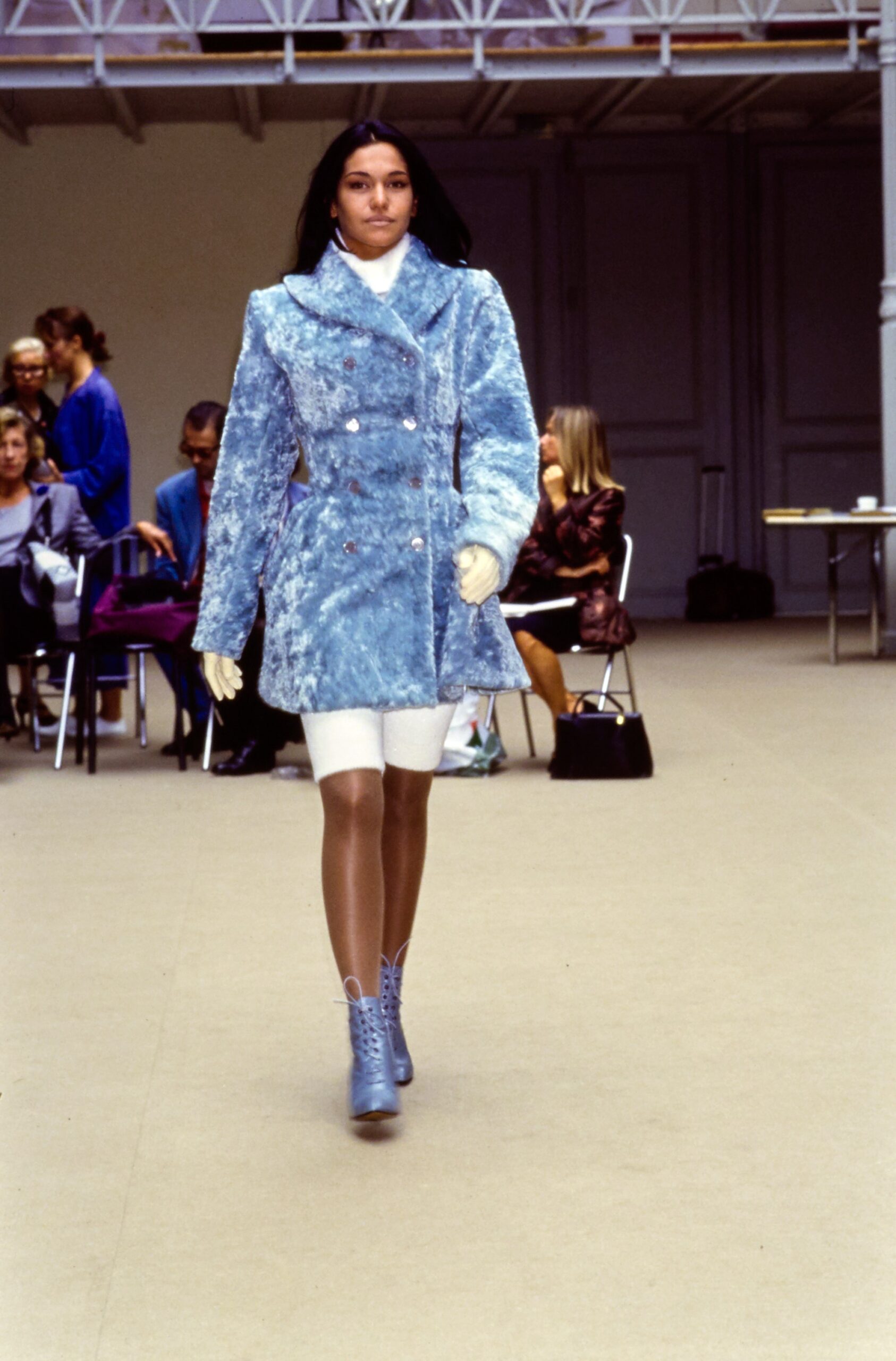 blue faux-fur coat with shorts