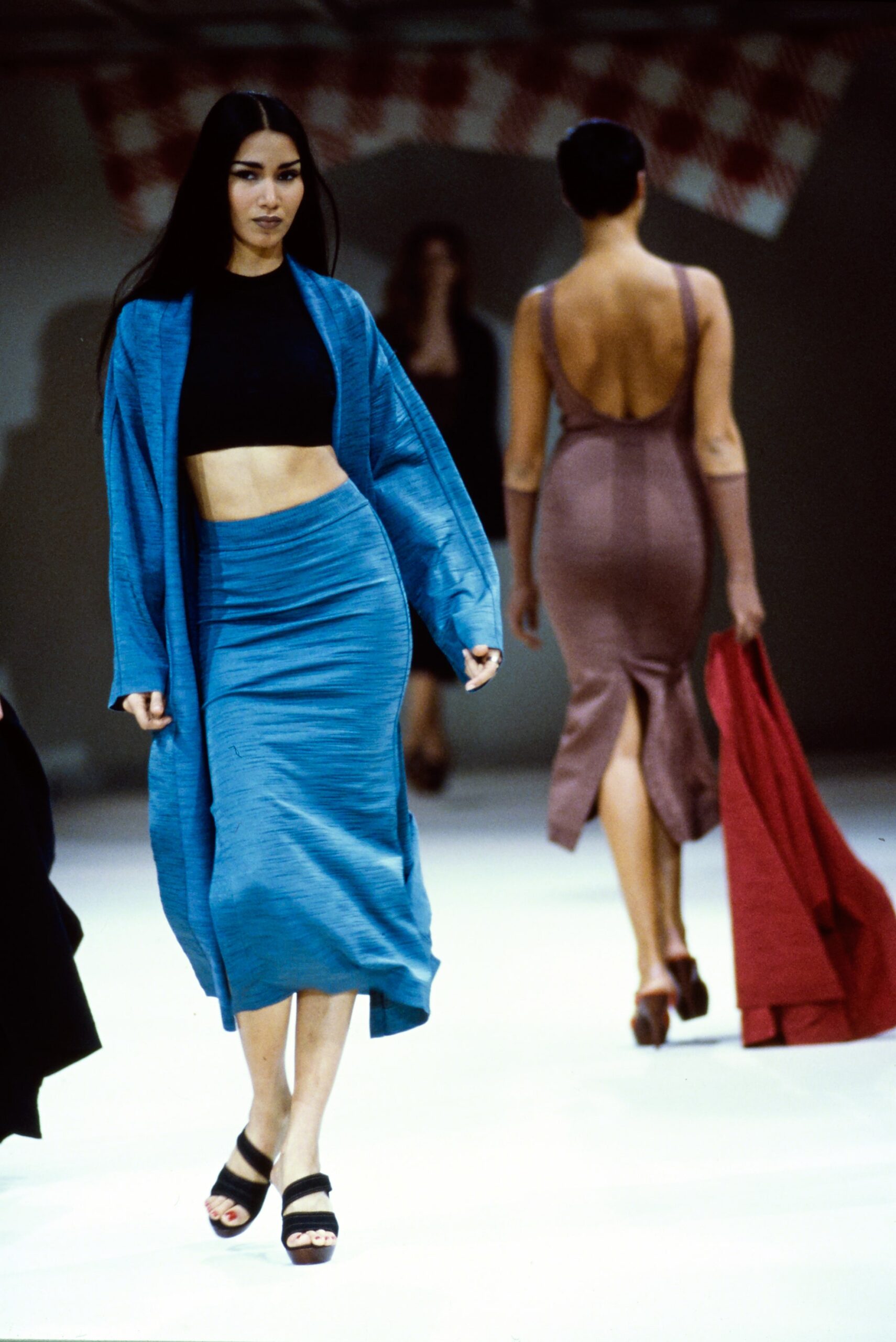 black fitted top with blue skirt