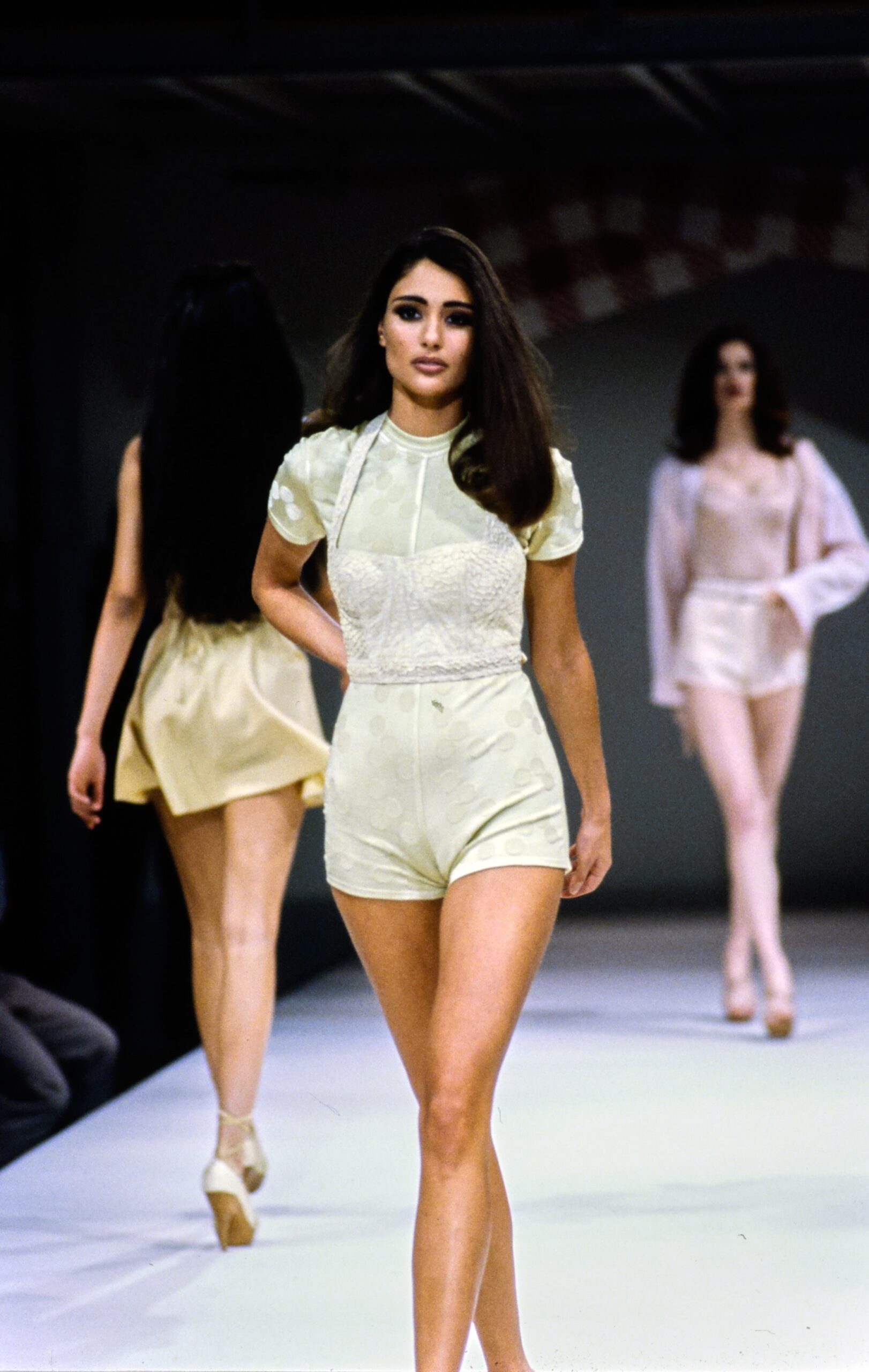 ivory fitted romper and beige skirt