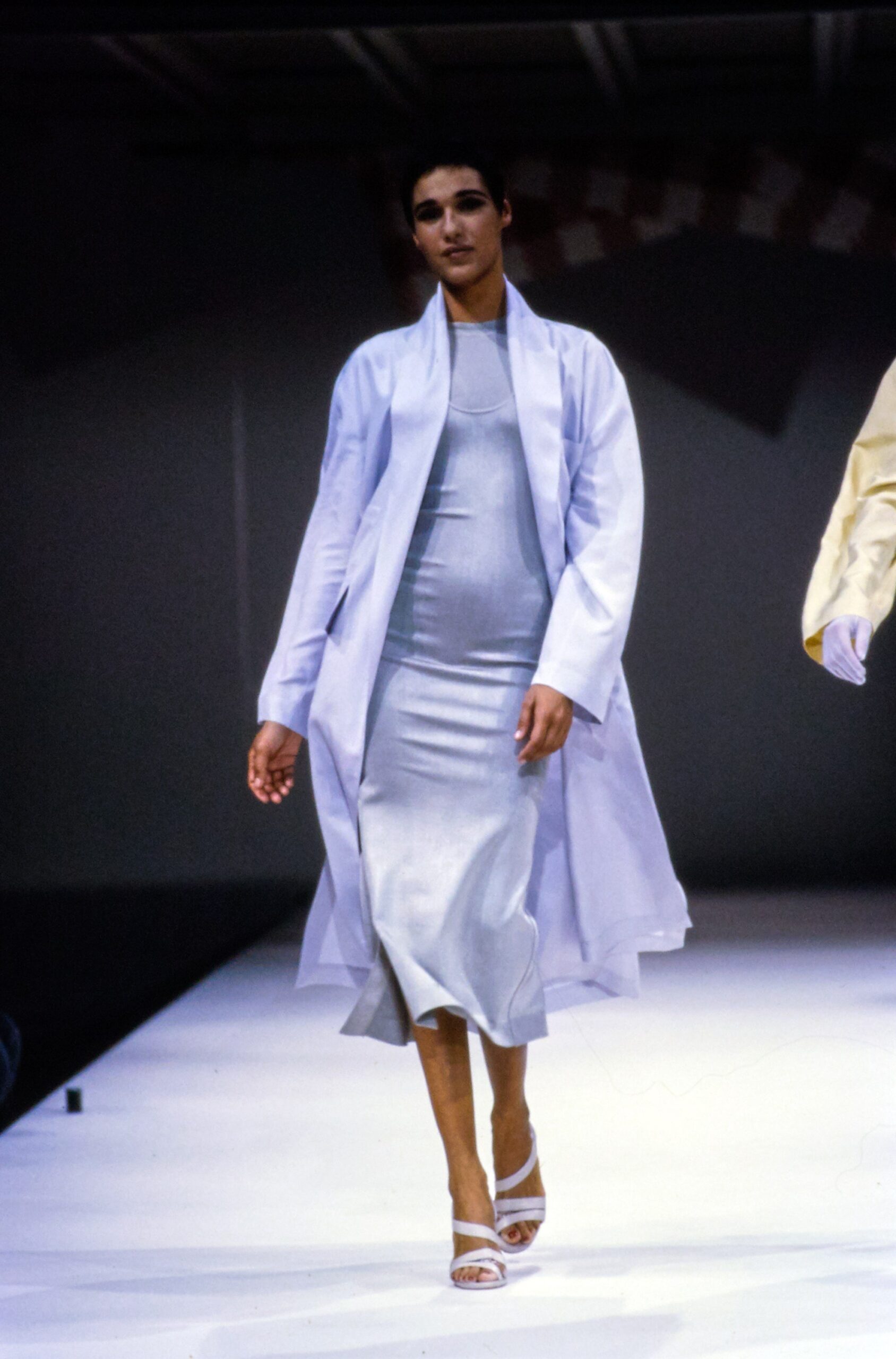 gray silk fitted midi dress with white coat