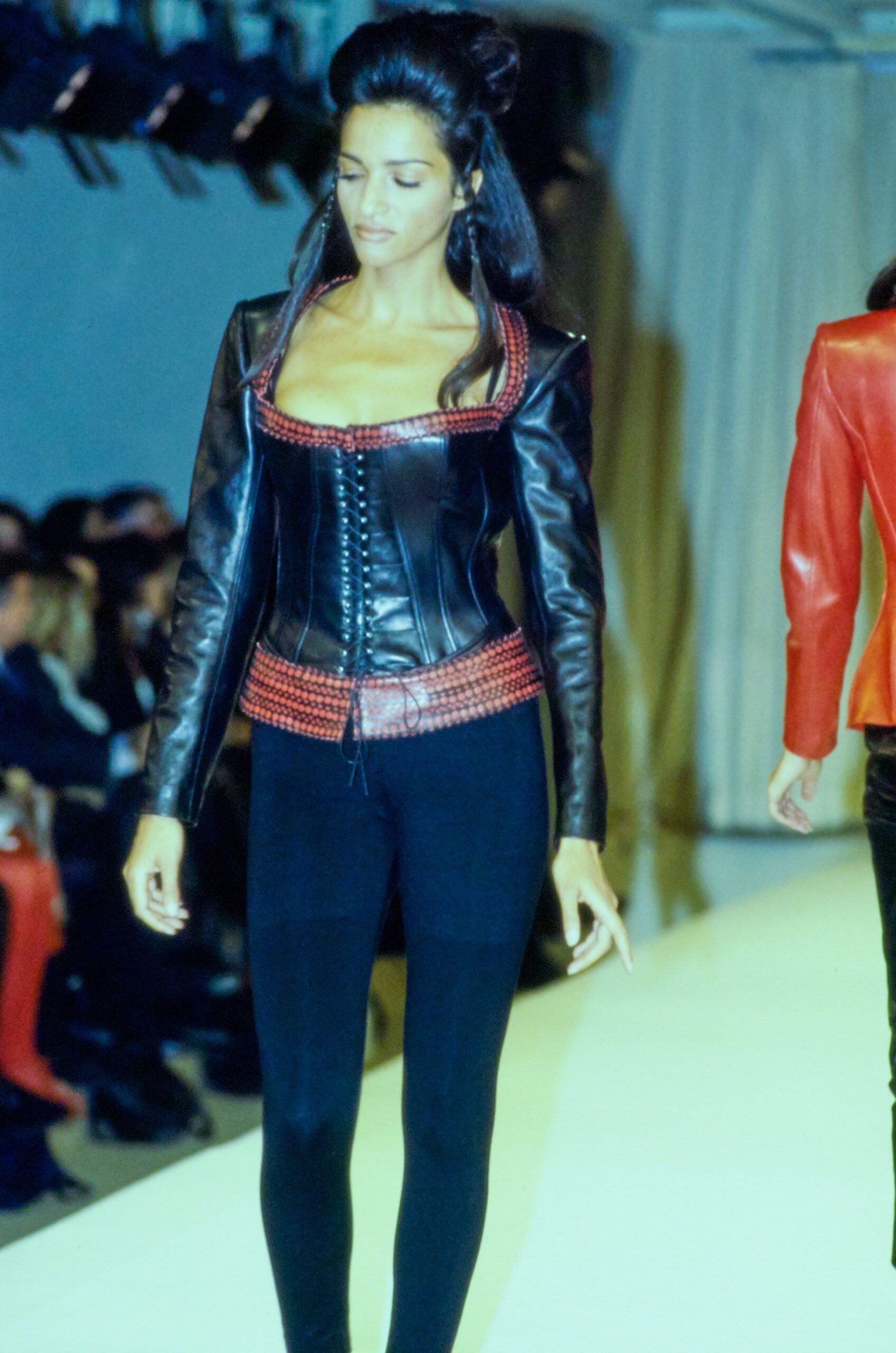 black leather sleeveless low-cut fitted zippered beaded bustier
