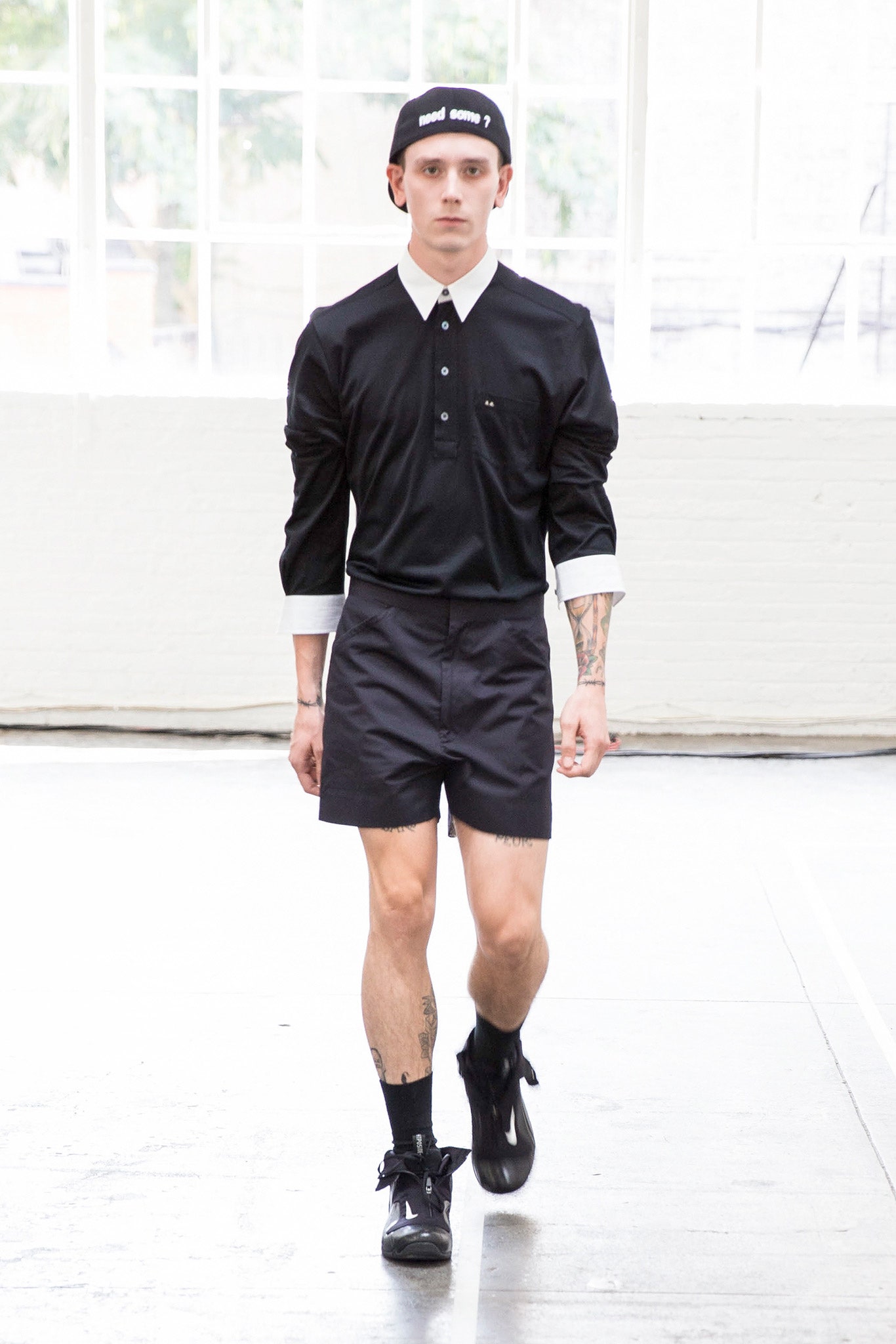 black fitted shirt and shorts