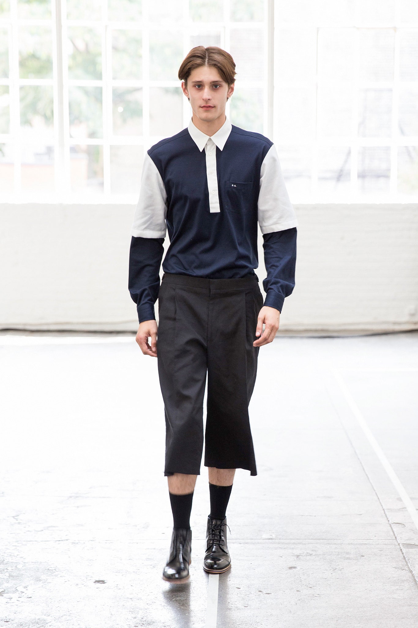 navy and white color-blocked shirt with cropped pants