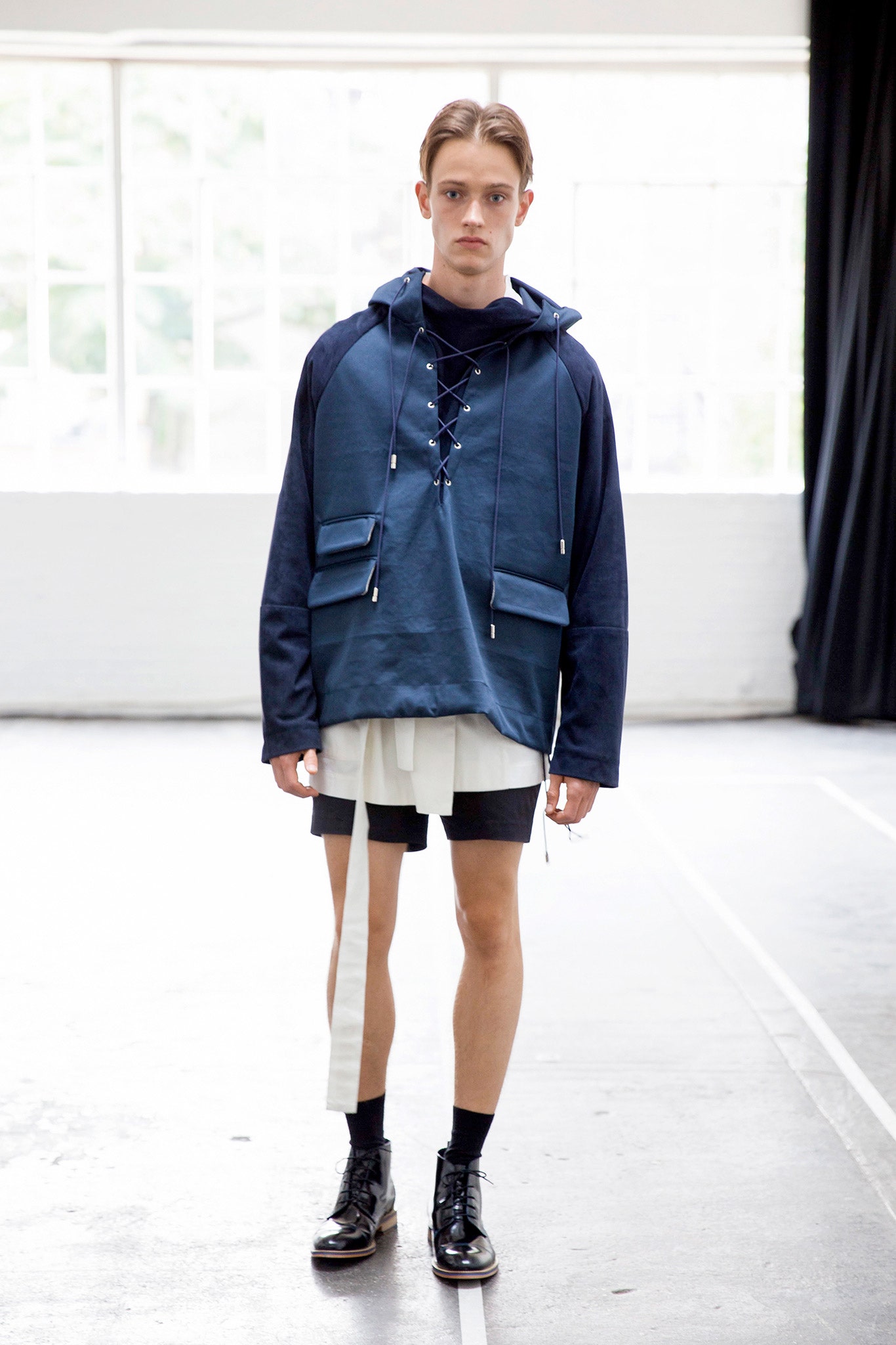 blue relaxed hoodie with black shorts