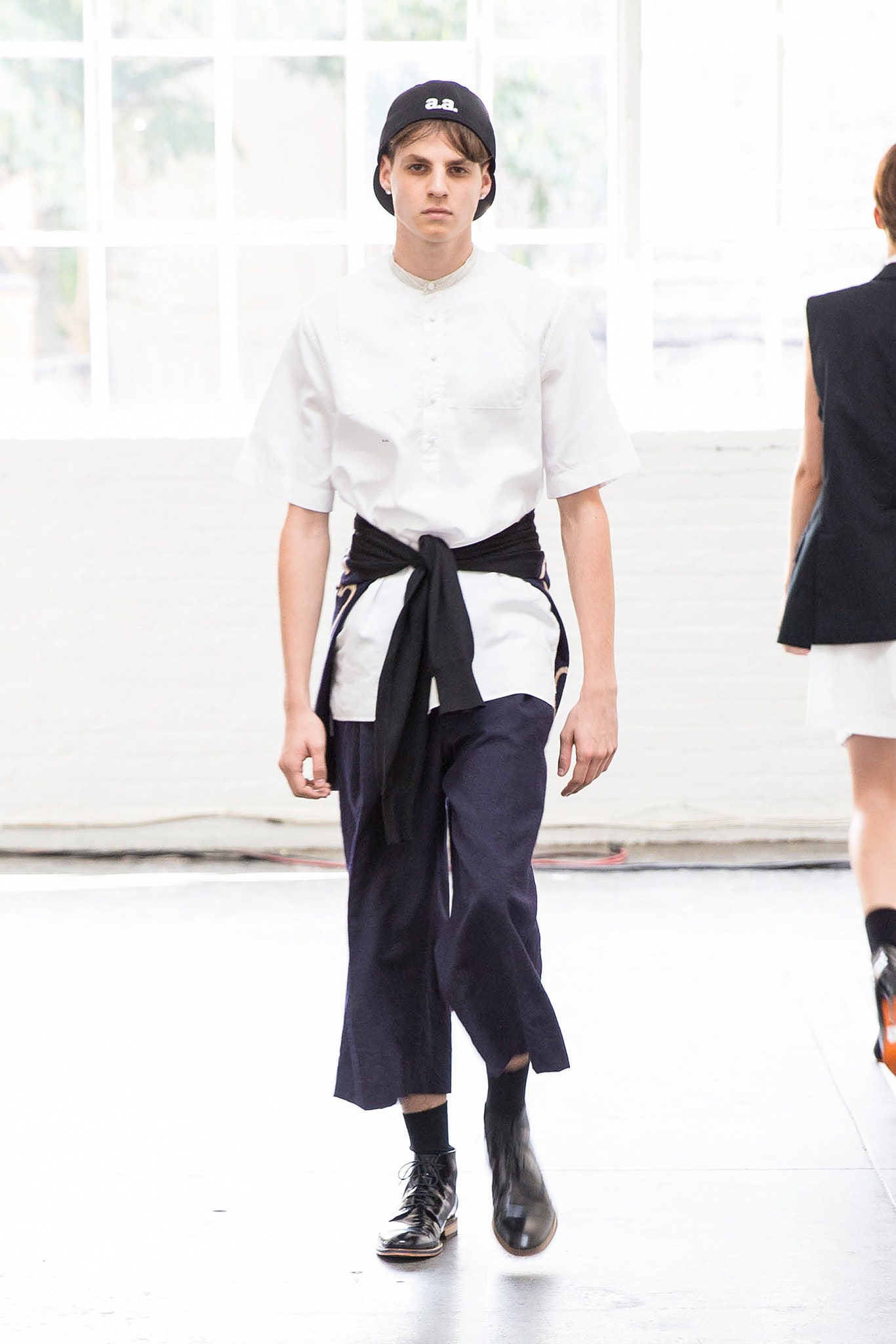 white relaxed shirt with navy pants