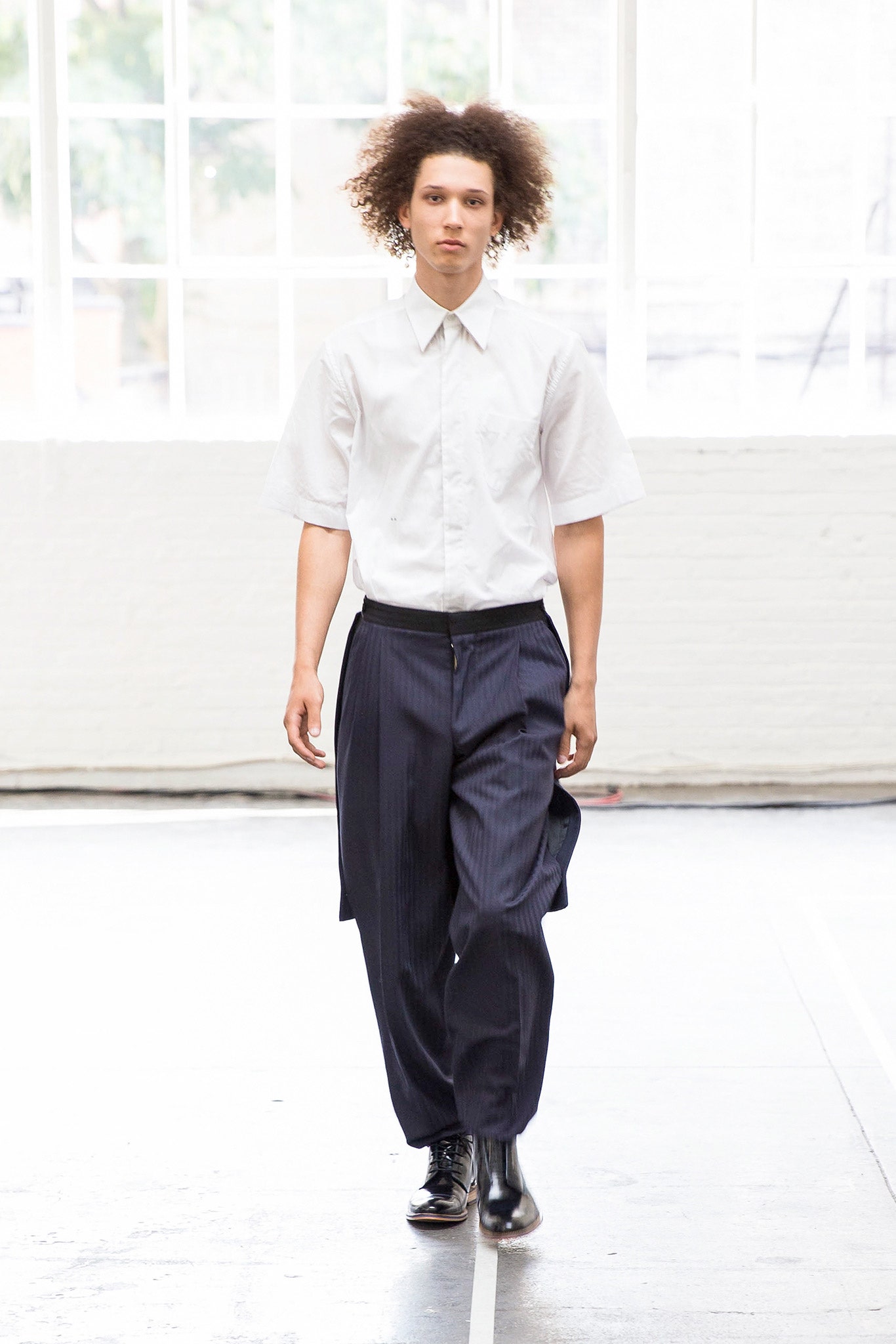 white relaxed shirt with navy pants