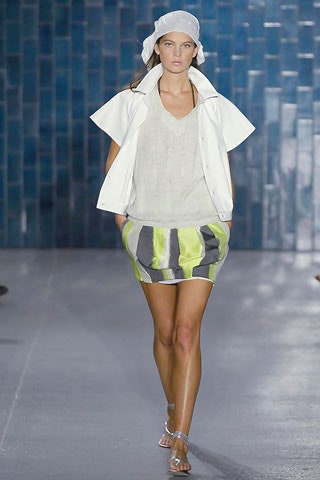 white jacket beige top multi skirt