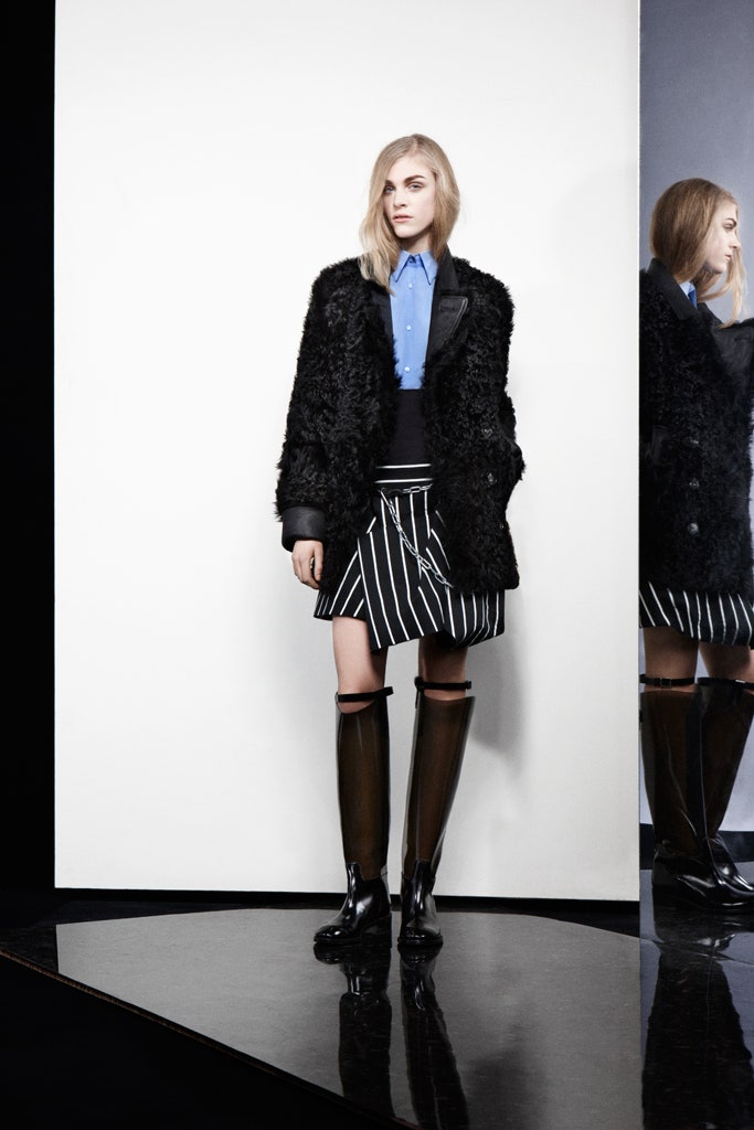 black faux-fur coat with blue shirt