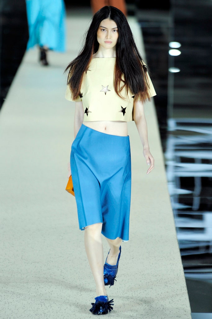 yellow embroidered top with blue skirt