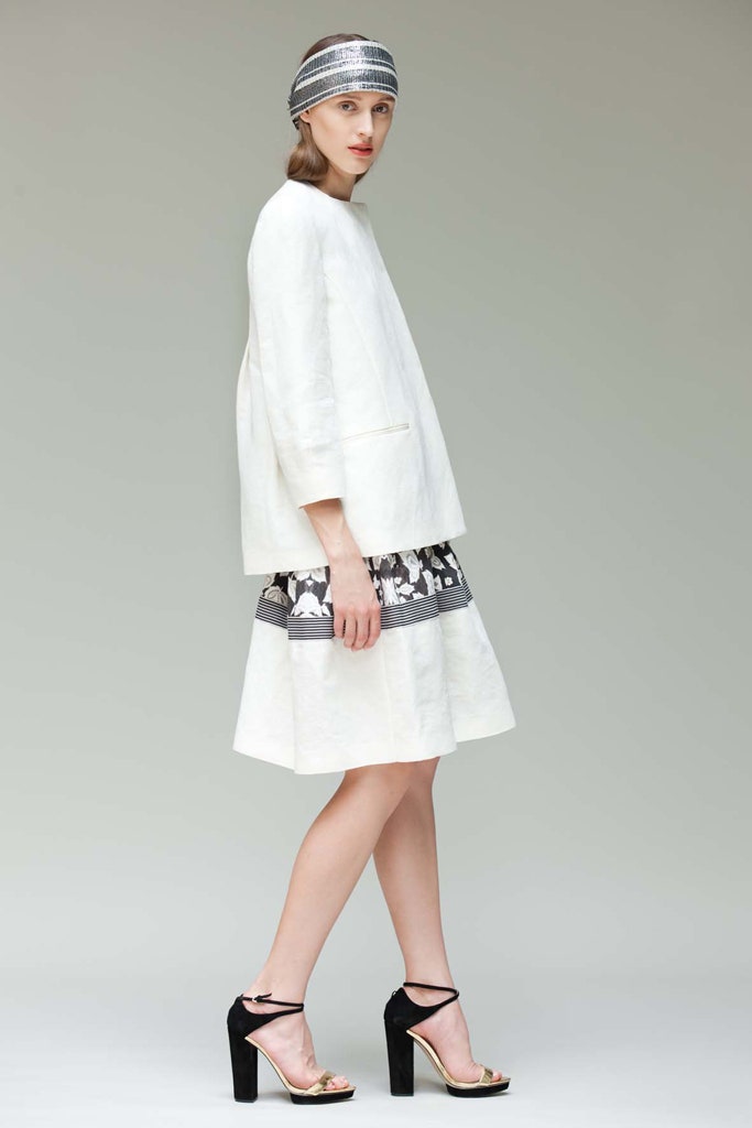 white relaxed top with mini skirt