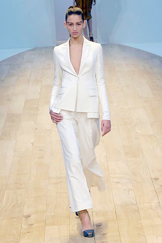 white tailored suit with black heels