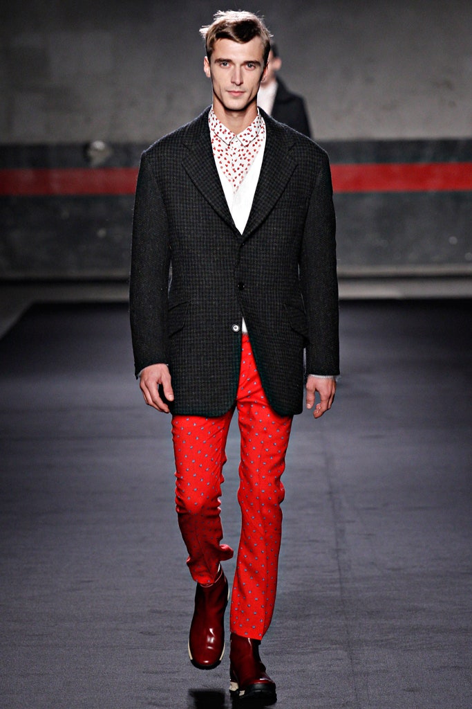 black tailored blazer red printed pants