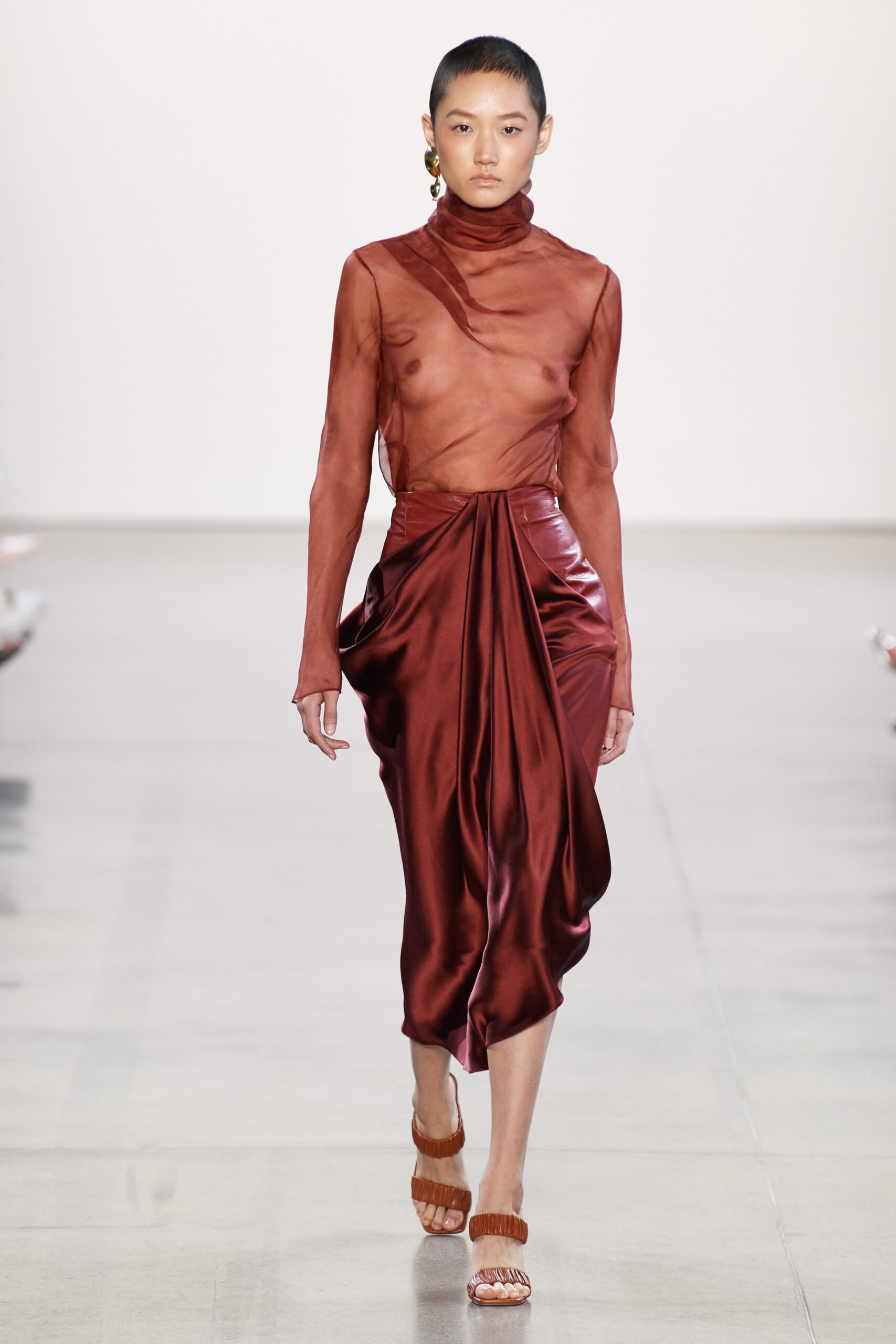 red silk fitted top and skirt