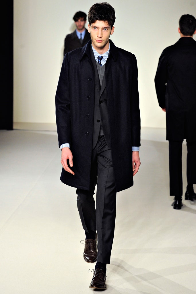 black wool coat with gray suit