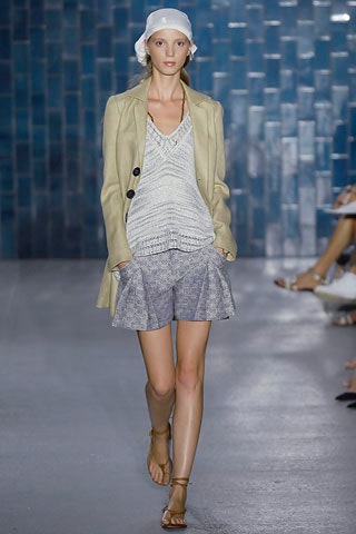 beige tailored coat with white top