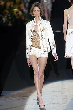 white embroidered jacket with beige top