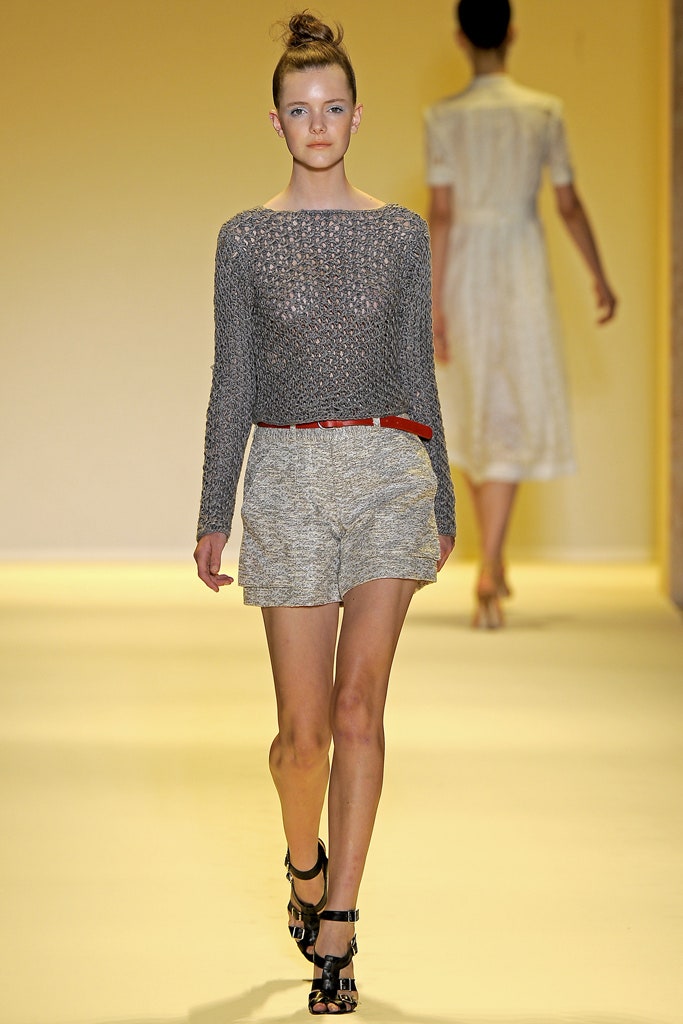 gray knit top with beige shorts