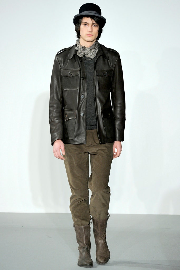 black leather jacket gray sweater brown pants