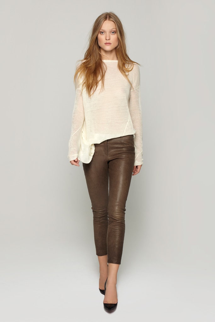 white relaxed top with brown pants