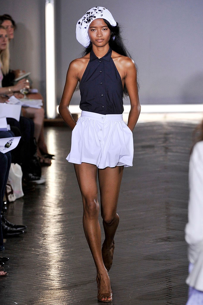 black sleeveless collared fitted top