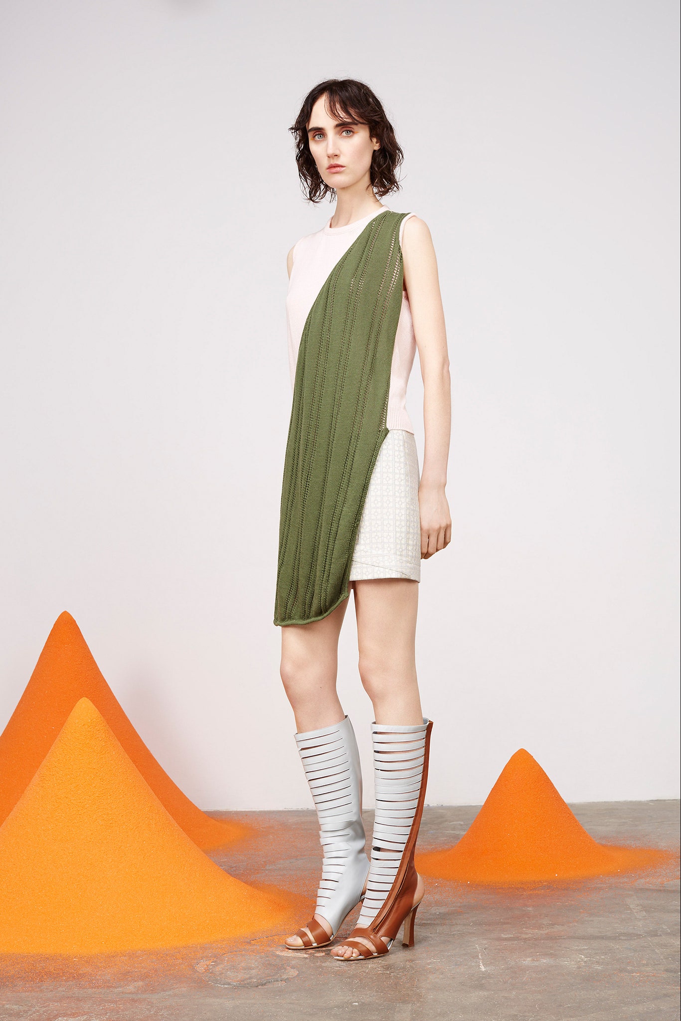 asymmetric white and green top with shorts