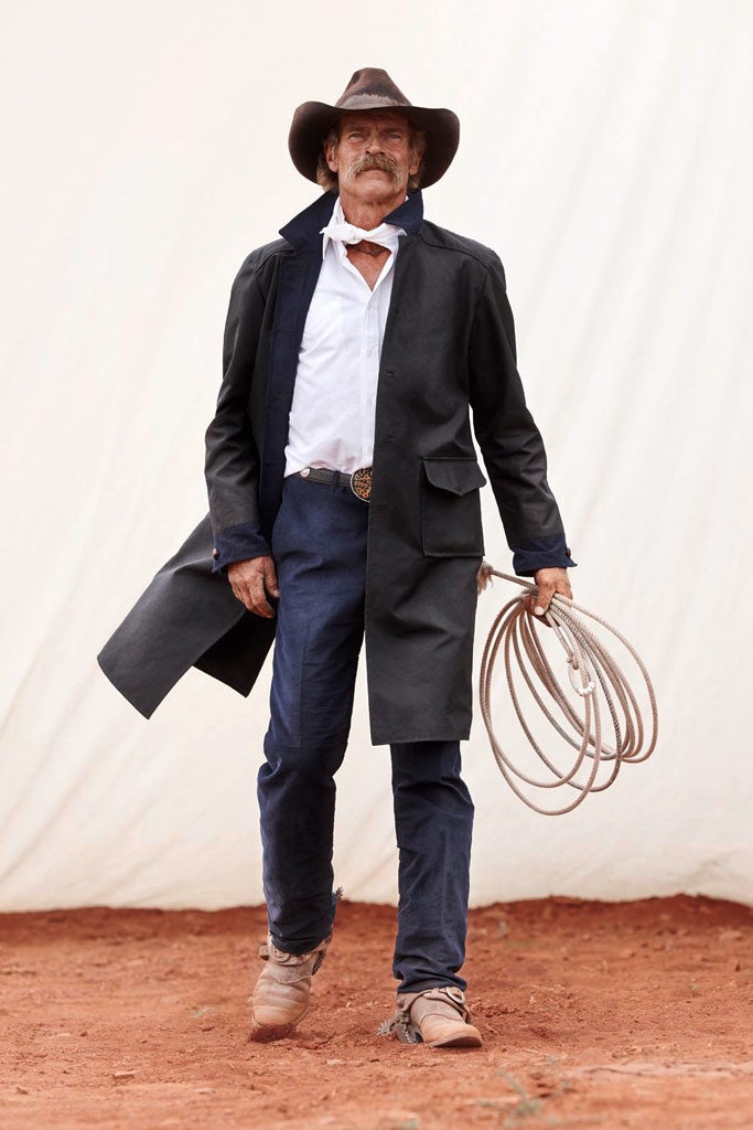 black coat white shirt blue pants