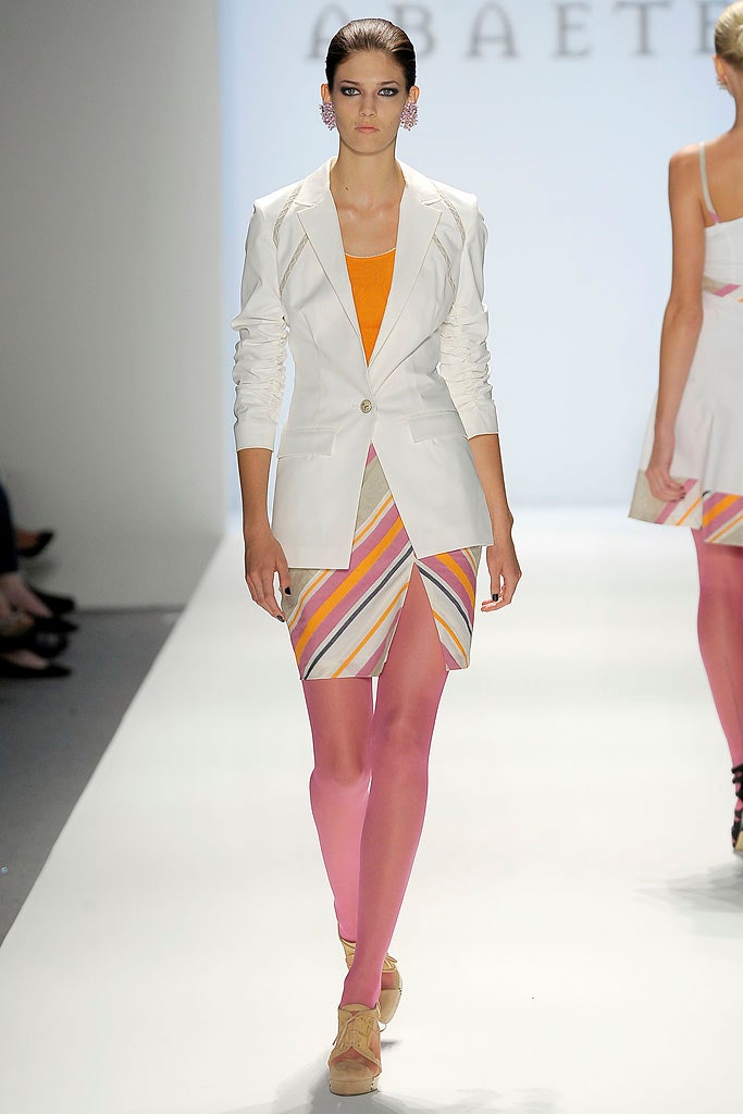 white tailored blazer with multi skirt