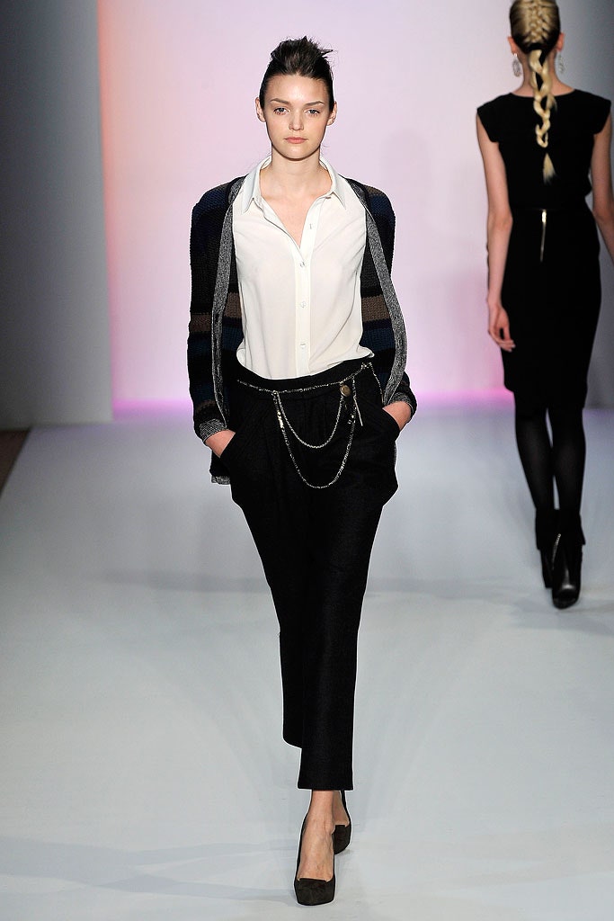 white fitted shirt with black tailored pants