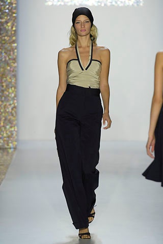 beige halter top with black pants
