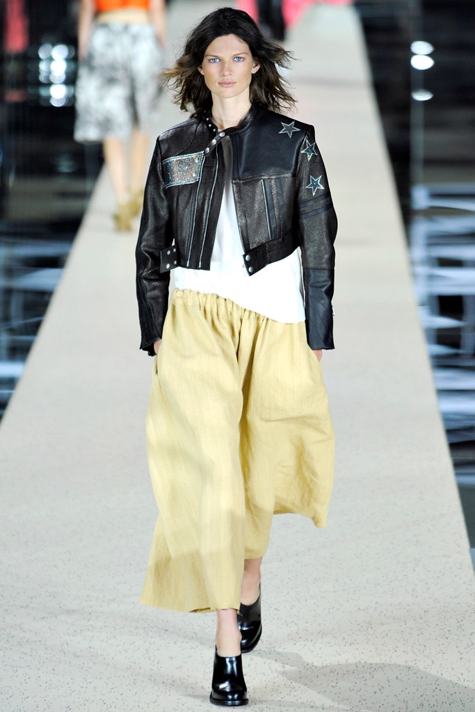black leather jacket with yellow skirt