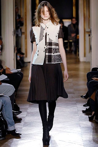 black pleated midi dress and patchwork blouse