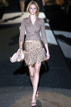 beige tailored blazer with gold skirt