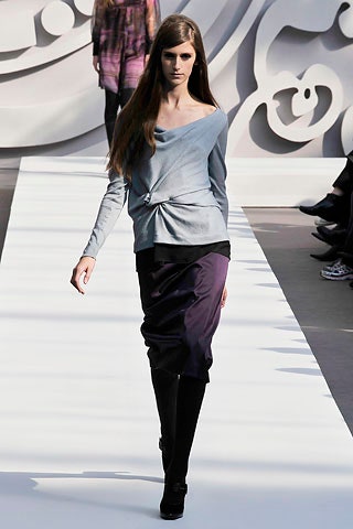 blue silk off-shoulder top with purple skirt