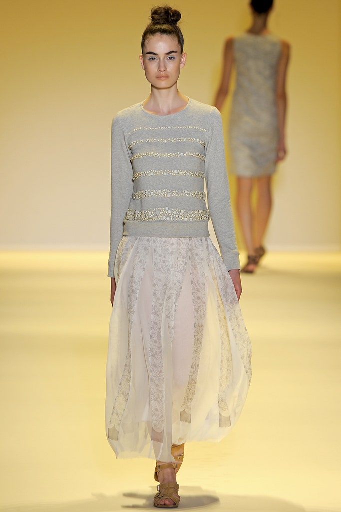gray beaded sweater with white layered skirt