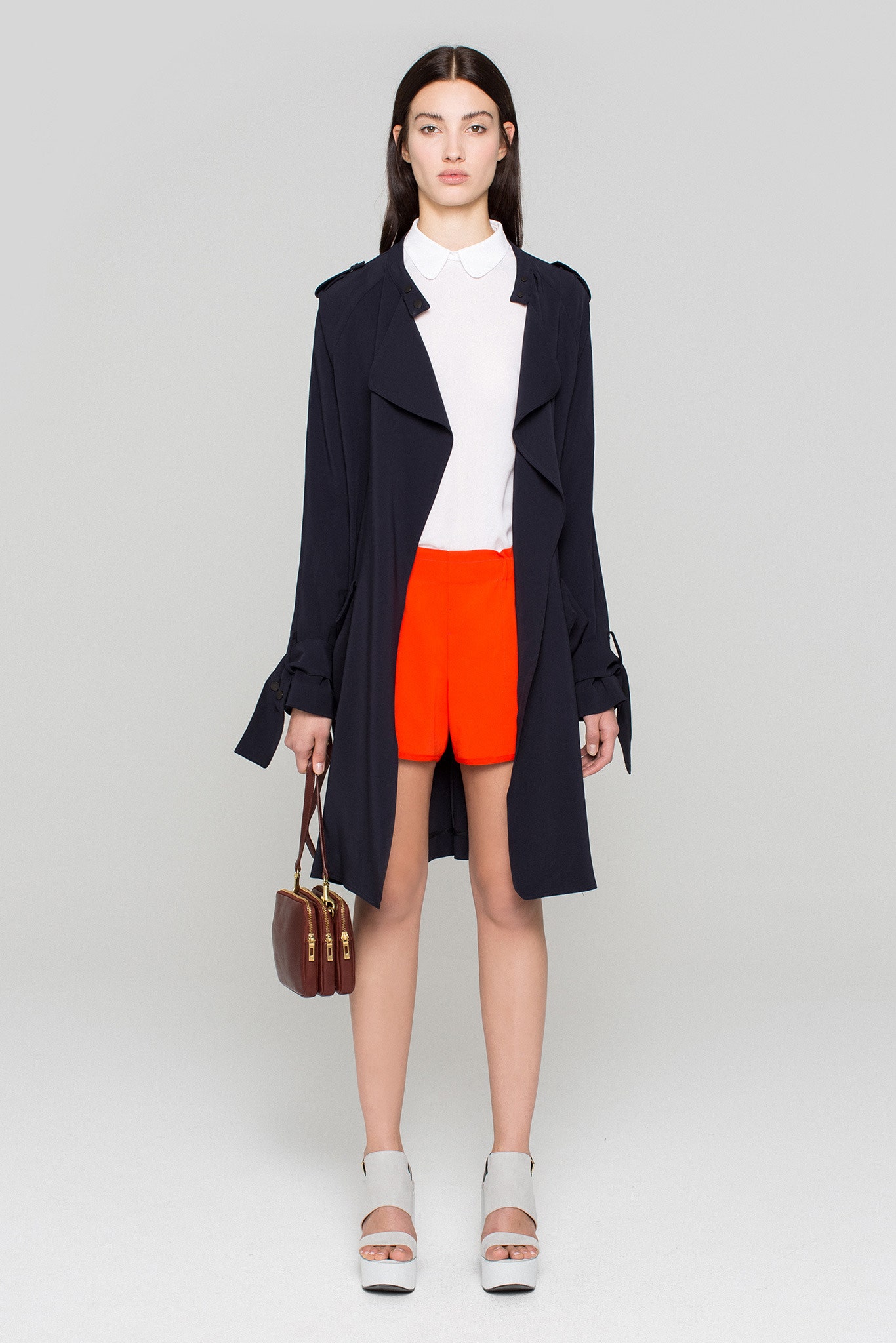 blue cotton long-sleeve collared relaxed buttoned trench