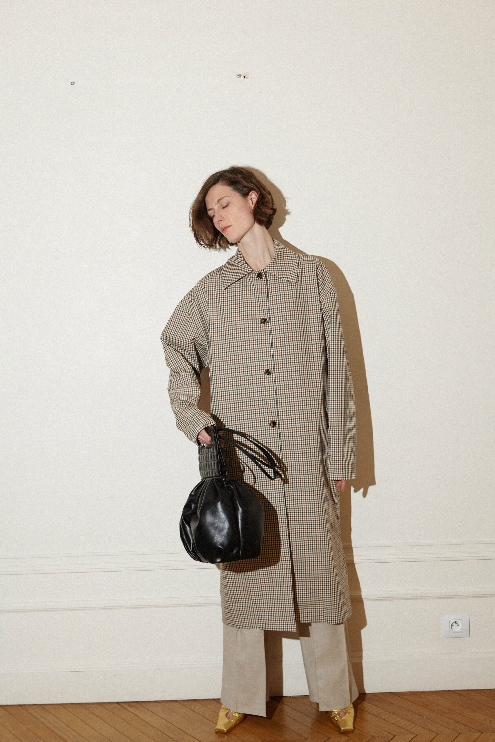 beige checked coat with tailored pants