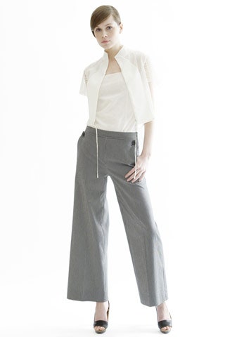 white silk fitted top with gray pants