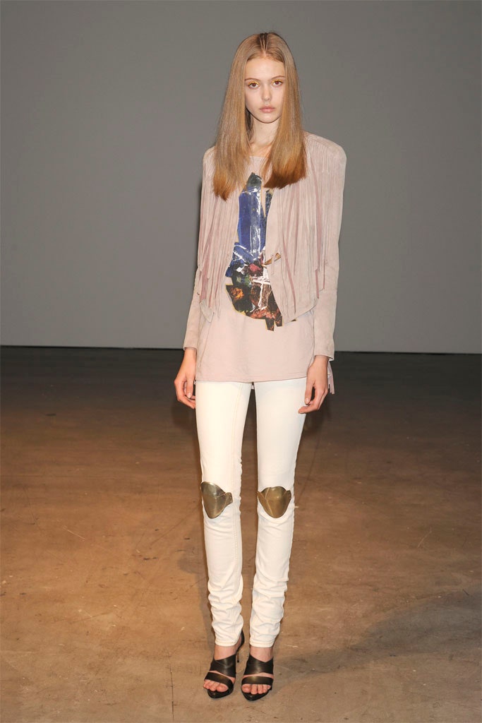 beige fringed top with white pants