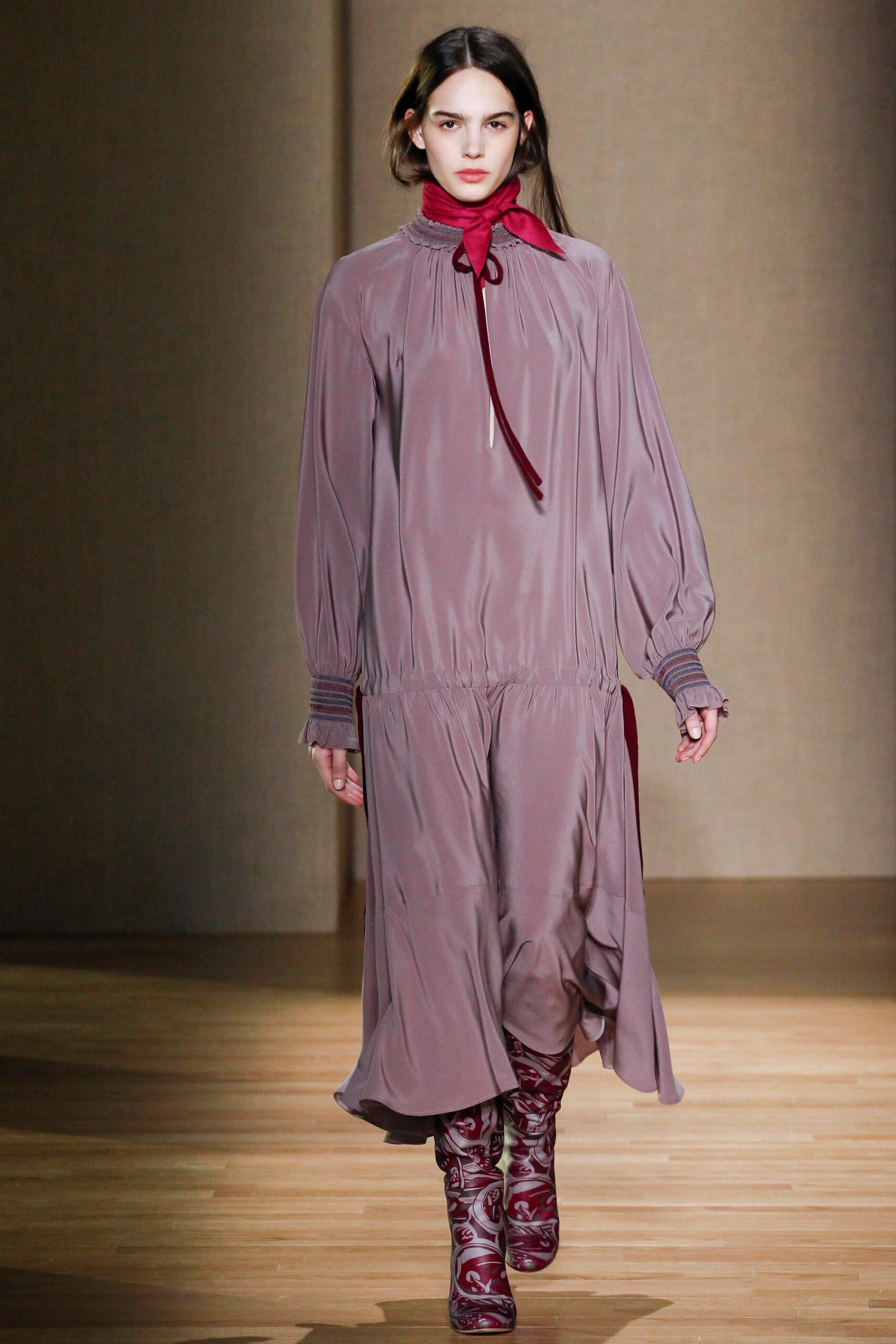 pink silk relaxed midi dress with red boots