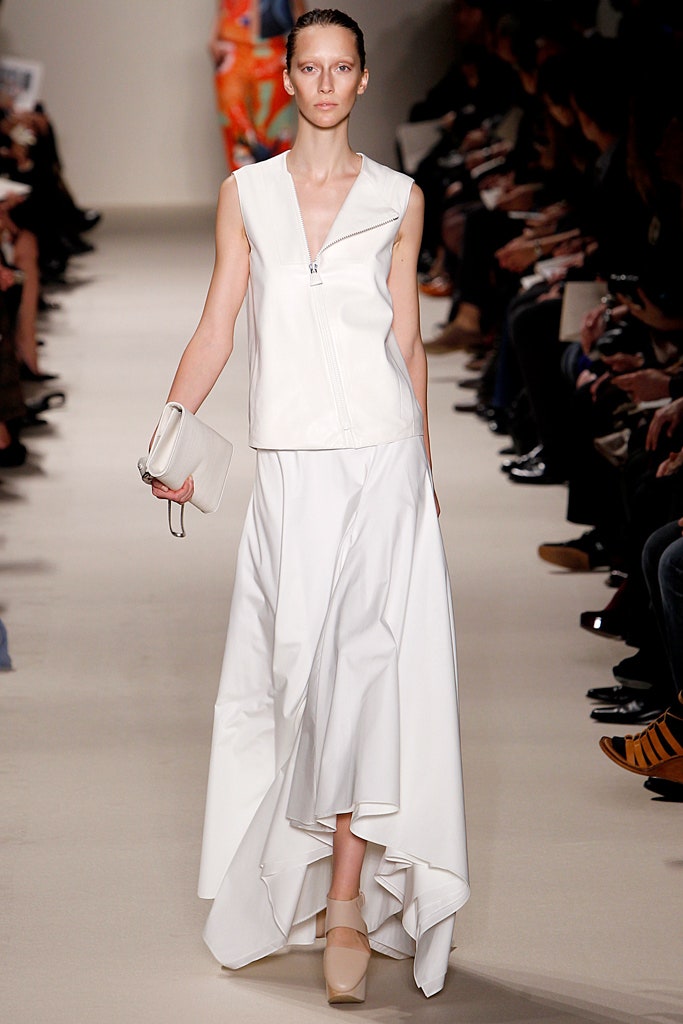 white leather fitted top and skirt