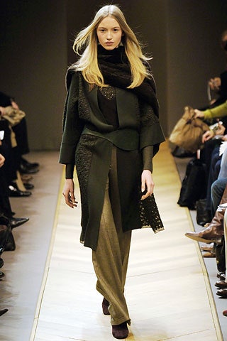 green wool relaxed coat and beige tailored pants